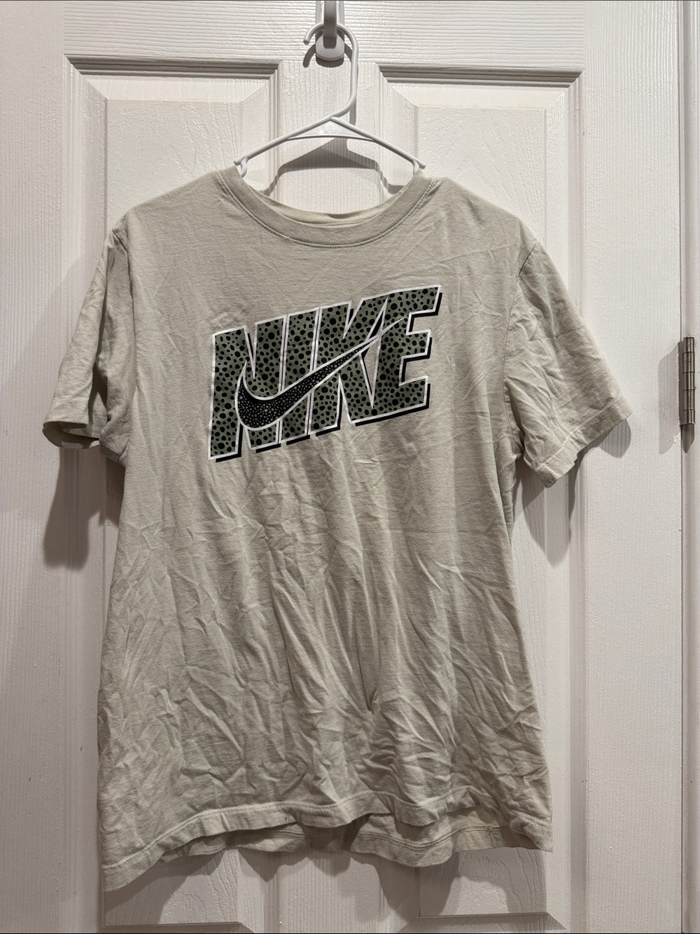 Nike Light Beige Short Sleeve Tee with Patterned Logo